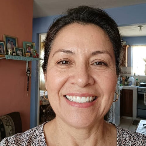 [Foto: sonrisa de cliente]